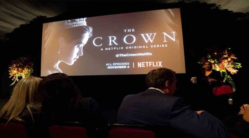 Screen displaying The Crown series